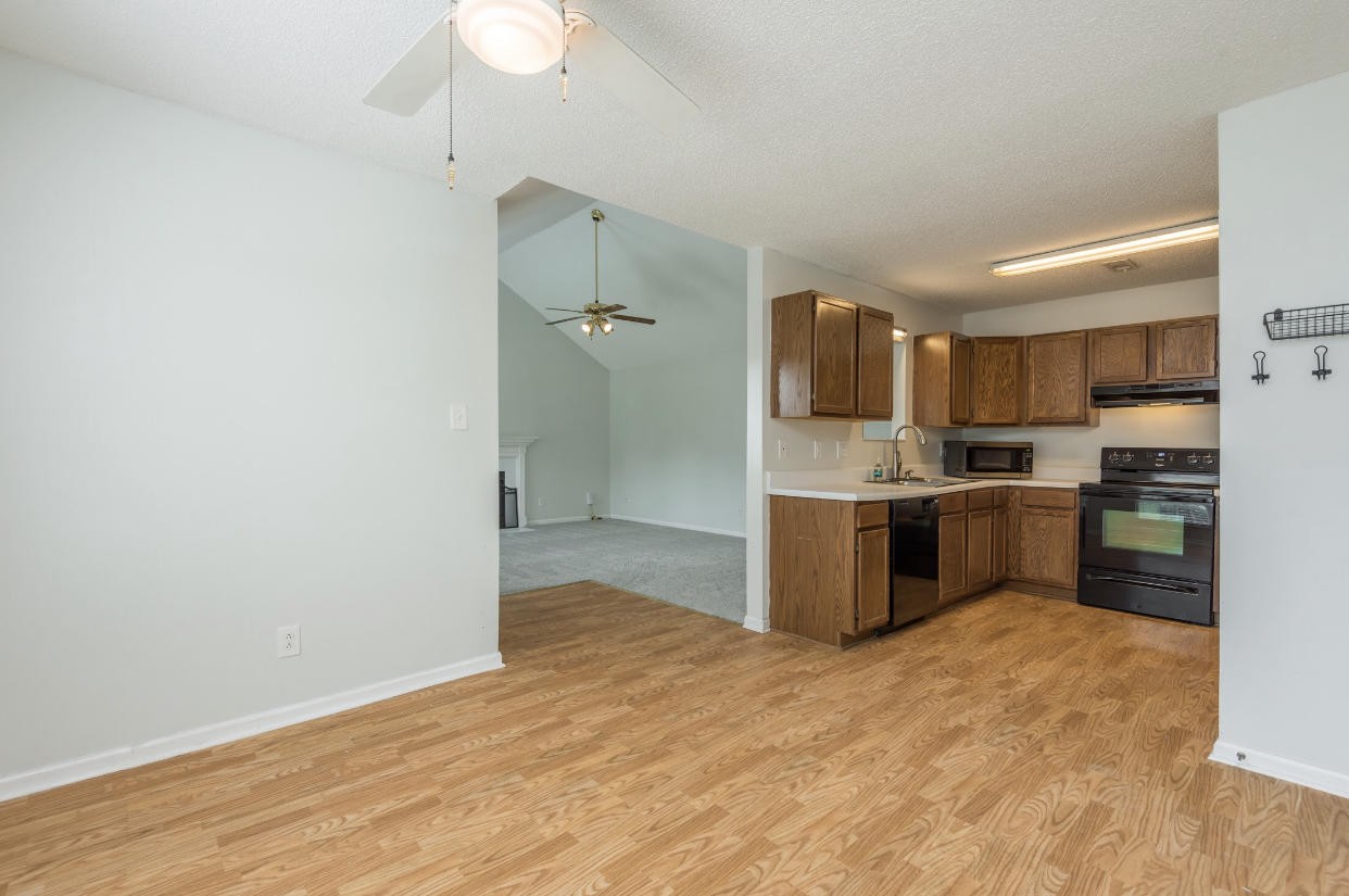 4337 Walnut Ridge Lane Knoxville, TN 37921 - Photo 10 of 24 a kitchen with a refrigerator and a sink