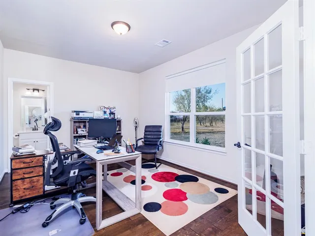 a very nice looking room with a large window