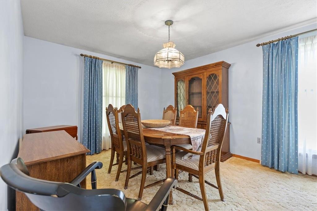 347 Lee Road Burgettstown, PA 15021 - Photo 16 of 48 a view of a dining room with furniture window and wooden floor