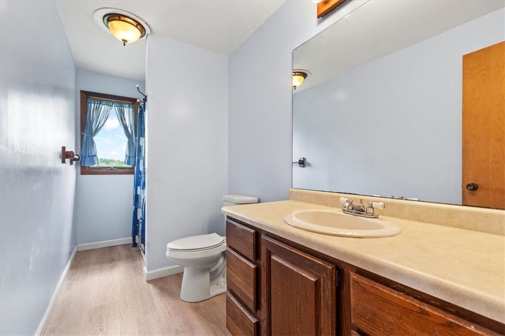 347 Lee Road Burgettstown, PA 15021 - Photo 20 of 48 a bathroom with a sink a toilet and vanity