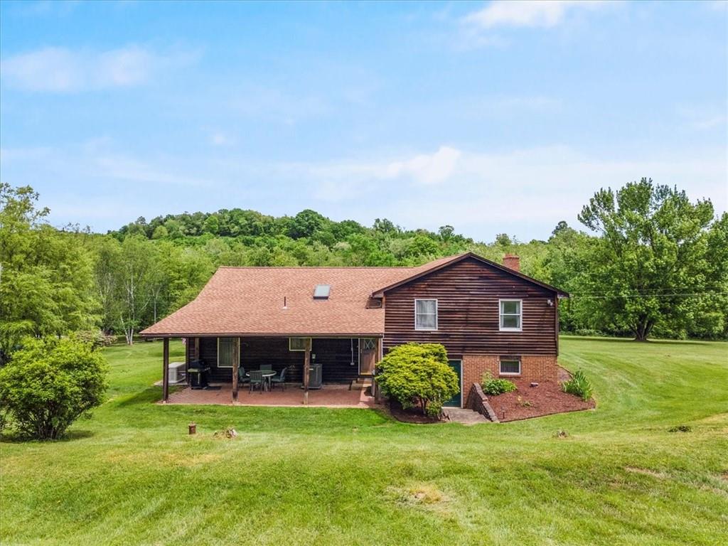 347 Lee Road Burgettstown, PA 15021 - Photo 48 of 48 a aerial view of a house with a big yard and large trees