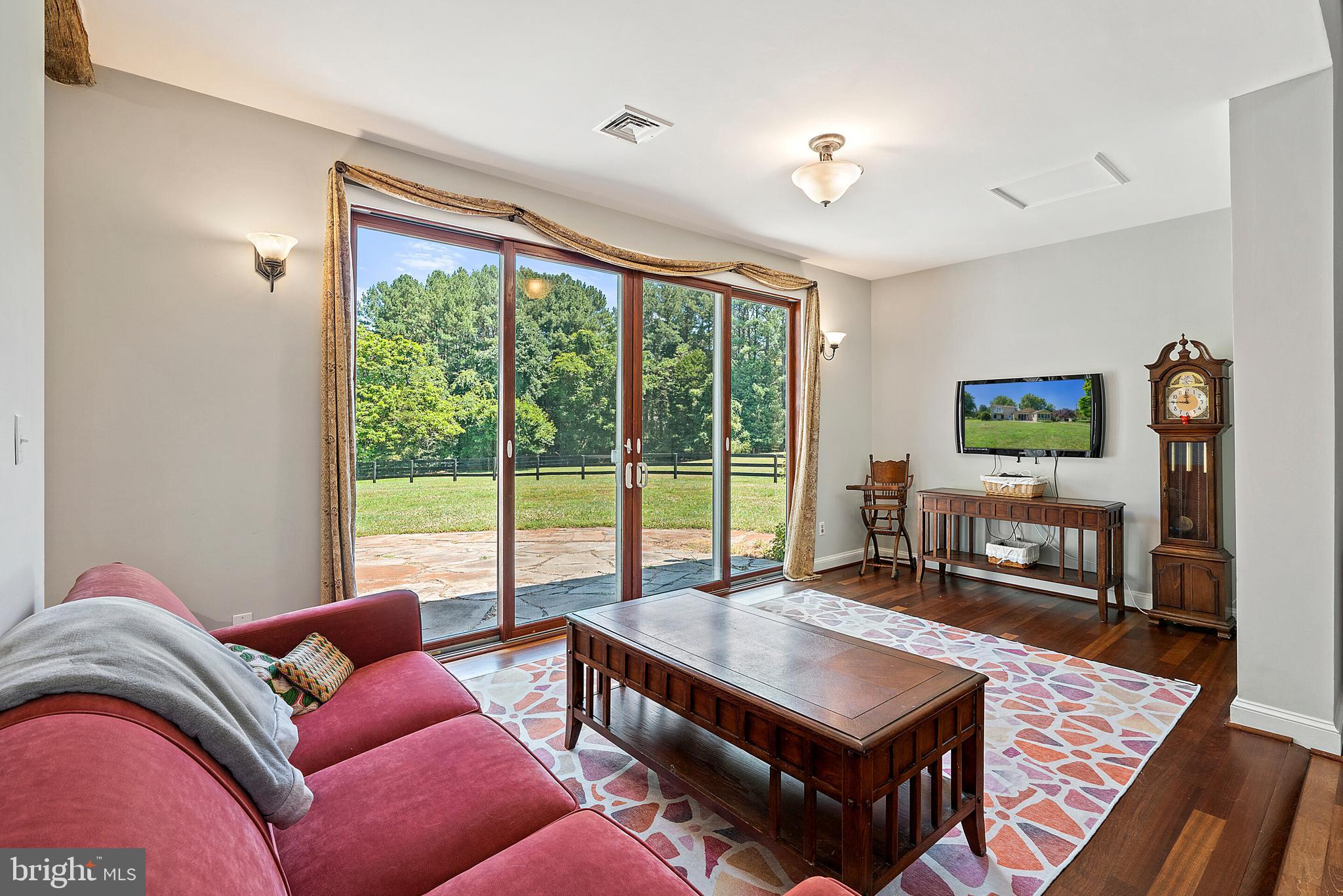 9045 Springs Road Warrenton, VA 20186 - Photo 13 of 50 Light filled family room leading to the front yard