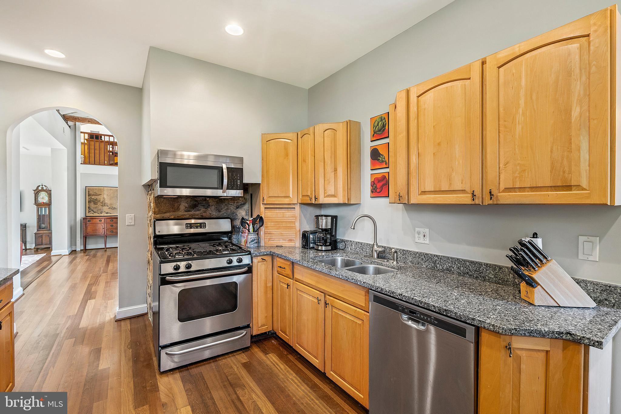 9045 Springs Road Warrenton, VA 20186 - Photo 15 of 50 Gas range and kitchen leading to the dining room