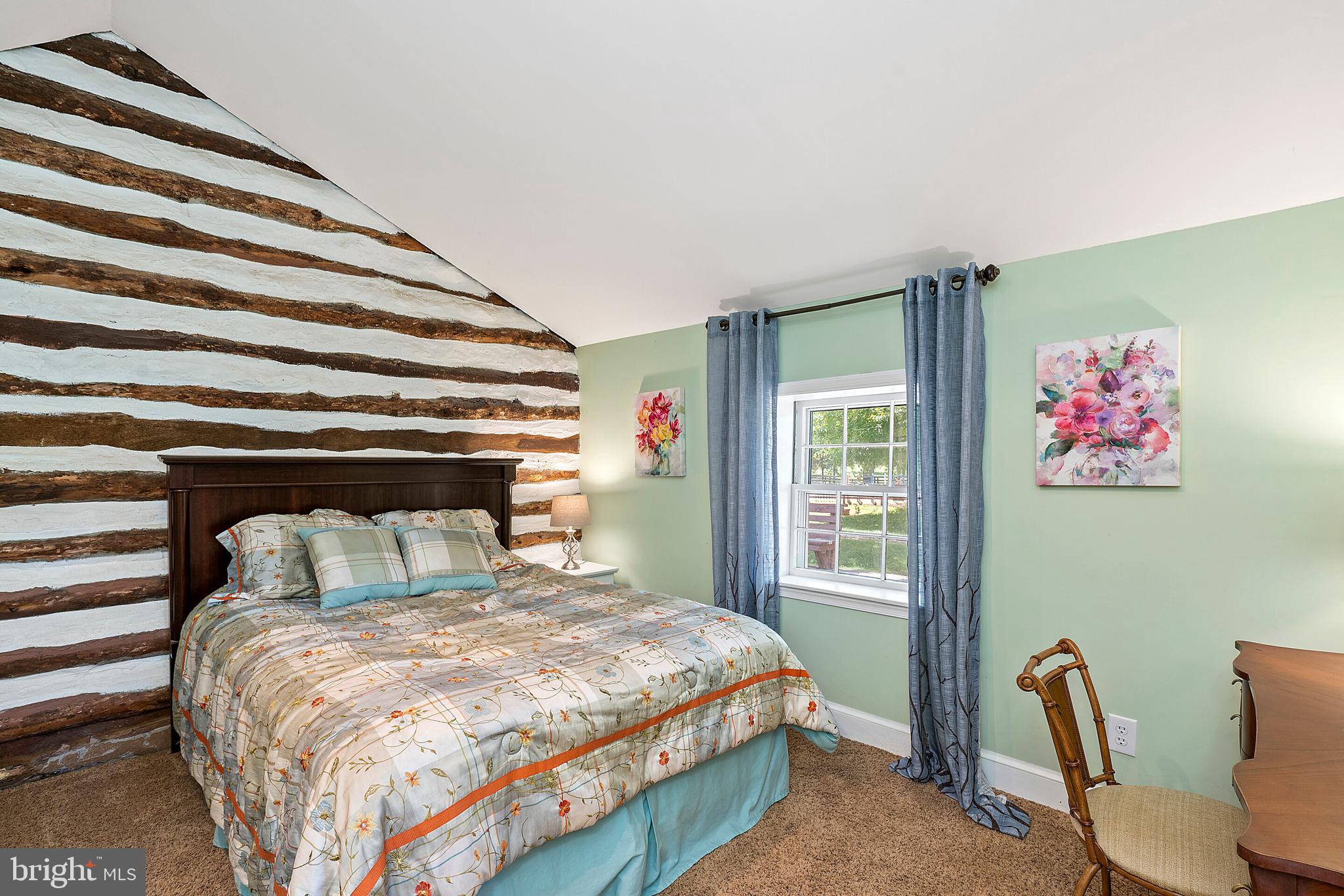 9045 Springs Road Warrenton, VA 20186 - Photo 22 of 50 Downstairs bedroom with charming exposed beams