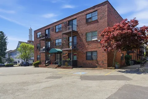 a front view of a building with street