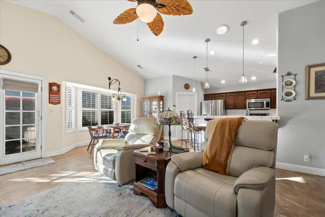 a kitchen with a stove microwave and cabinets