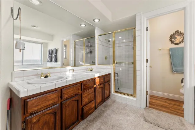 a bathroom with a toilet and a bathtub