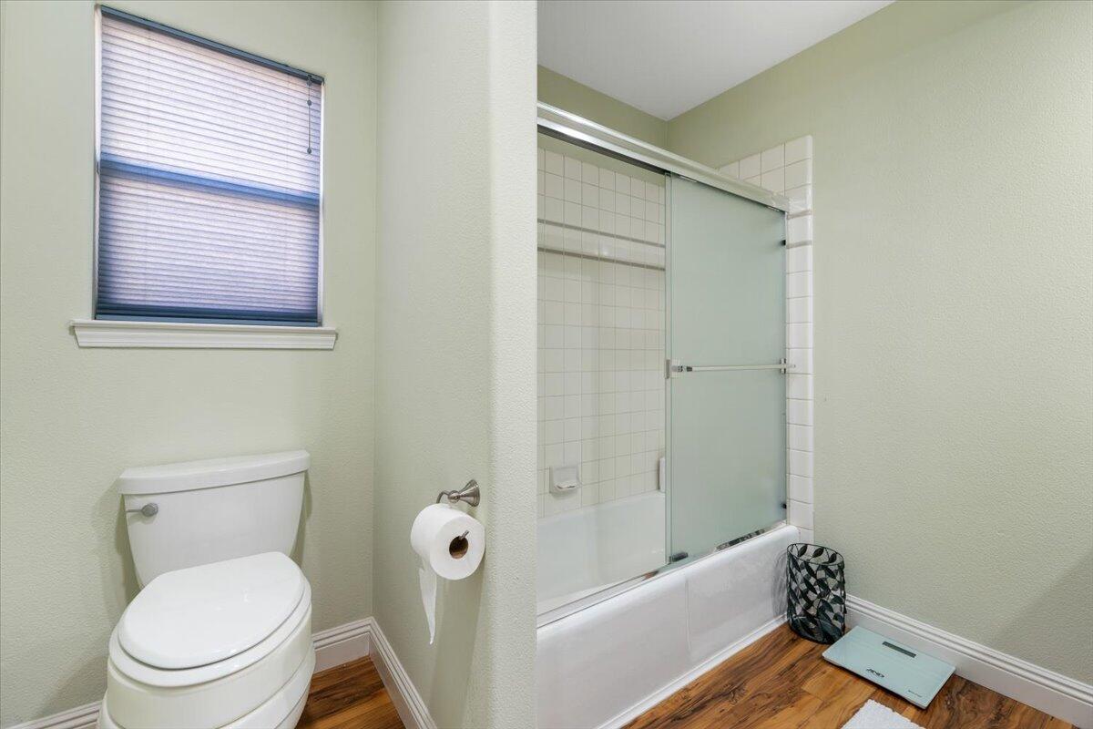 2995 Howard Drive Redding, CA 96001 - Photo 30 of 57 a bathroom with a toilet and a bathtub