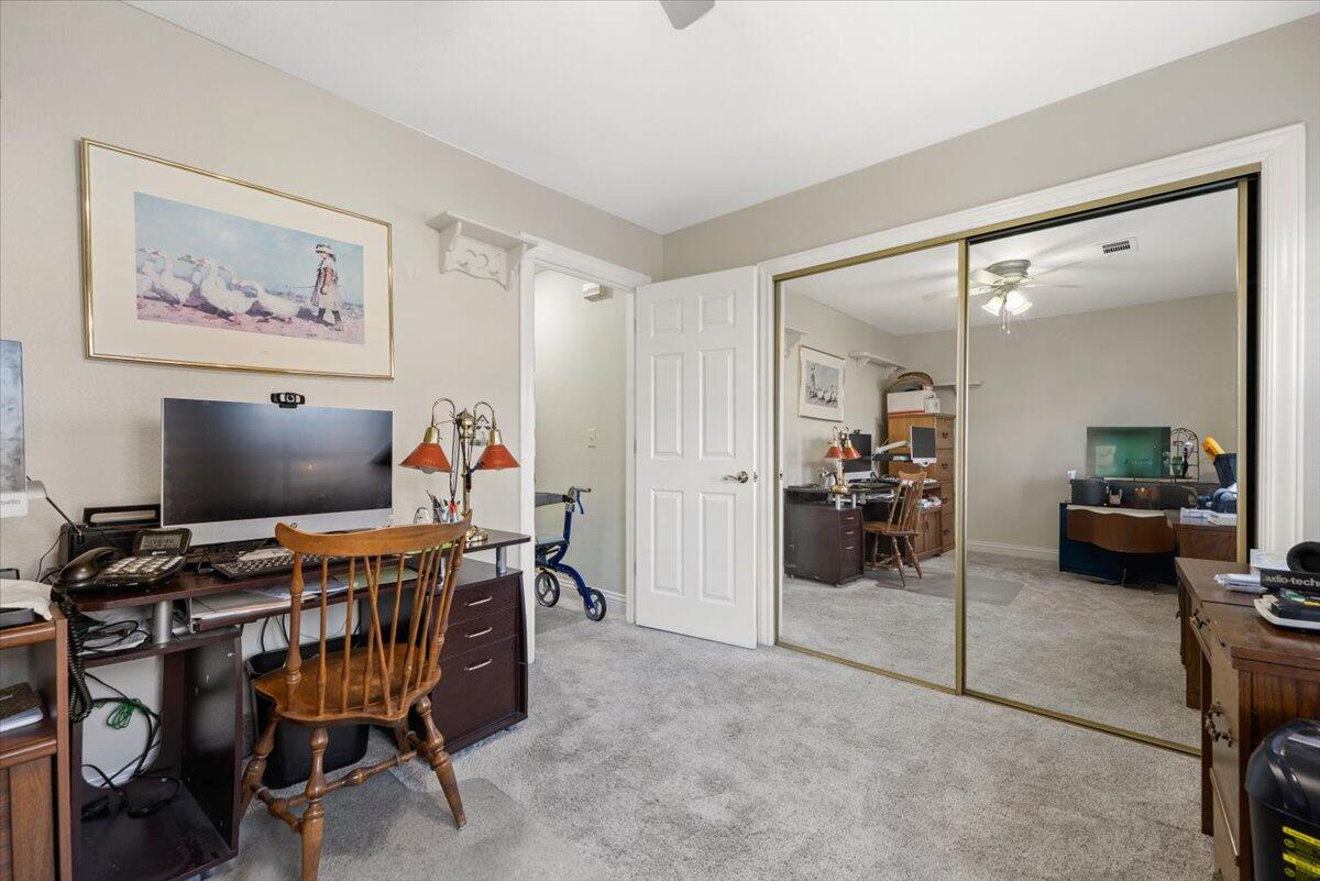 2995 Howard Drive Redding, CA 96001 - Photo 34 of 57 a workspace with furniture and a flat screen tv