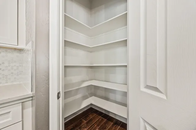 a empty closet with white paint