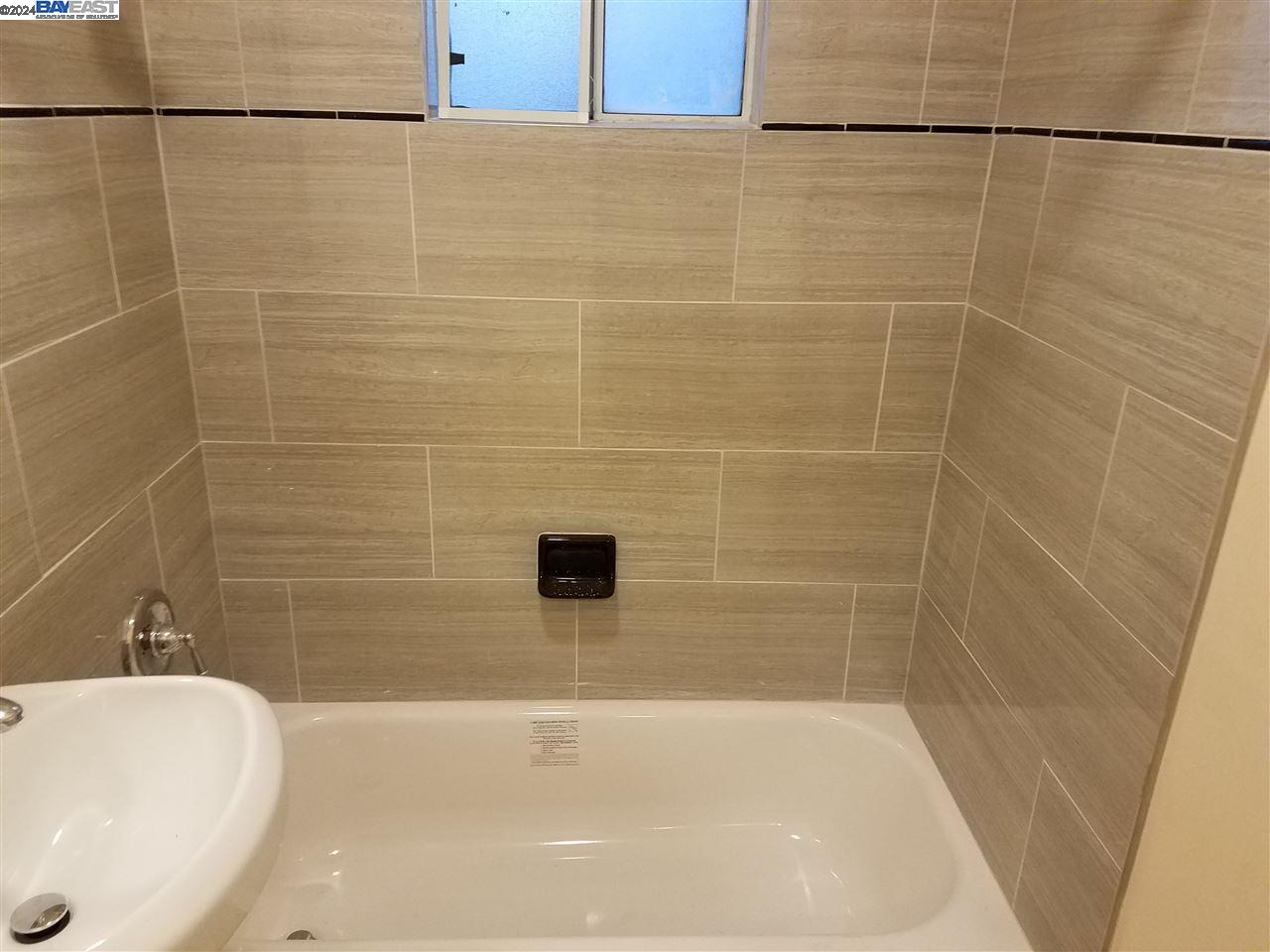 26730 Tyrrell Avenue Hayward, CA 94544 - Photo 18 of 26 a bathroom with a bathtub