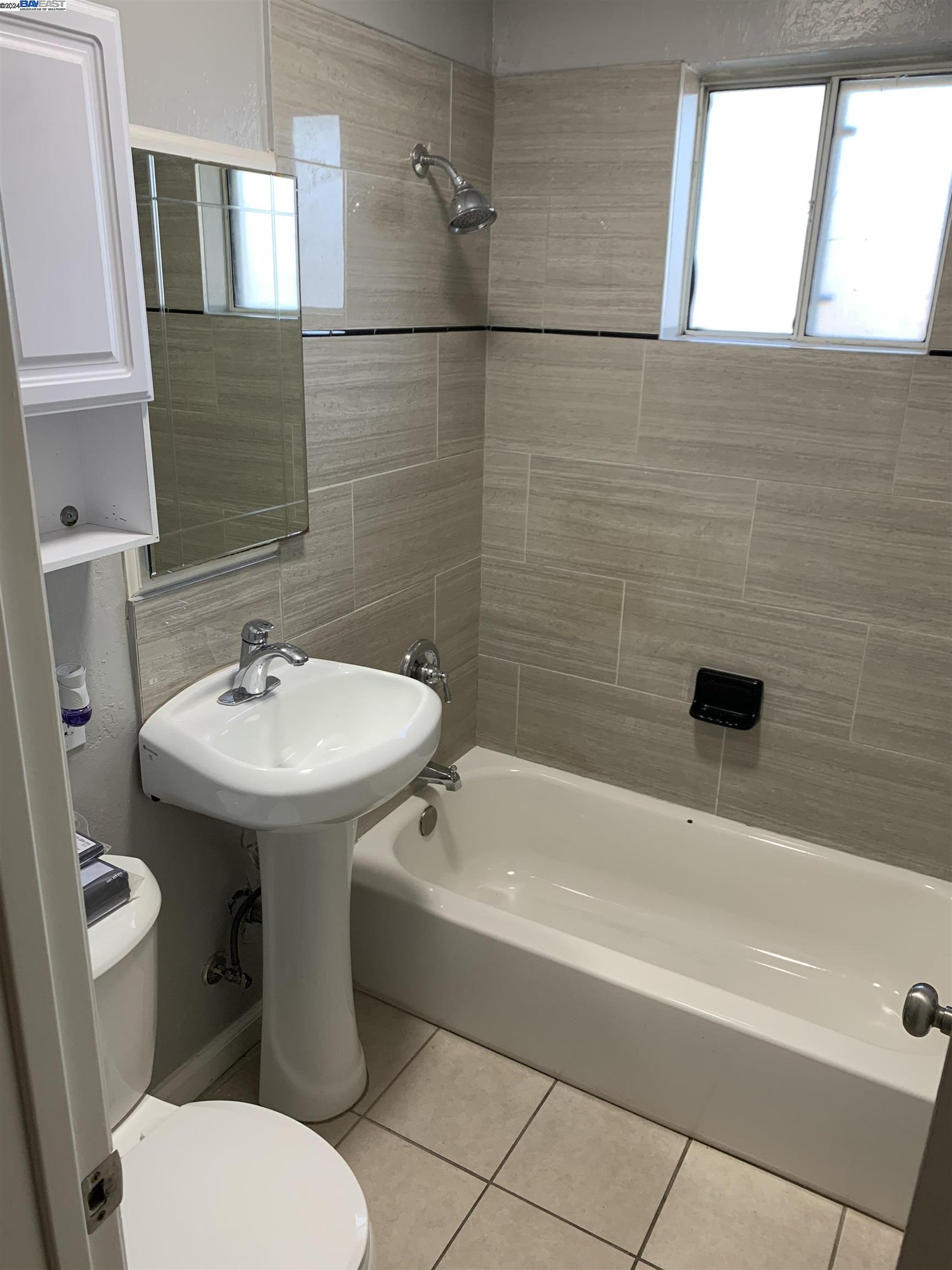 26730 Tyrrell Avenue Hayward, CA 94544 - Photo 26 of 26 a bathroom with a sink toilet and shower