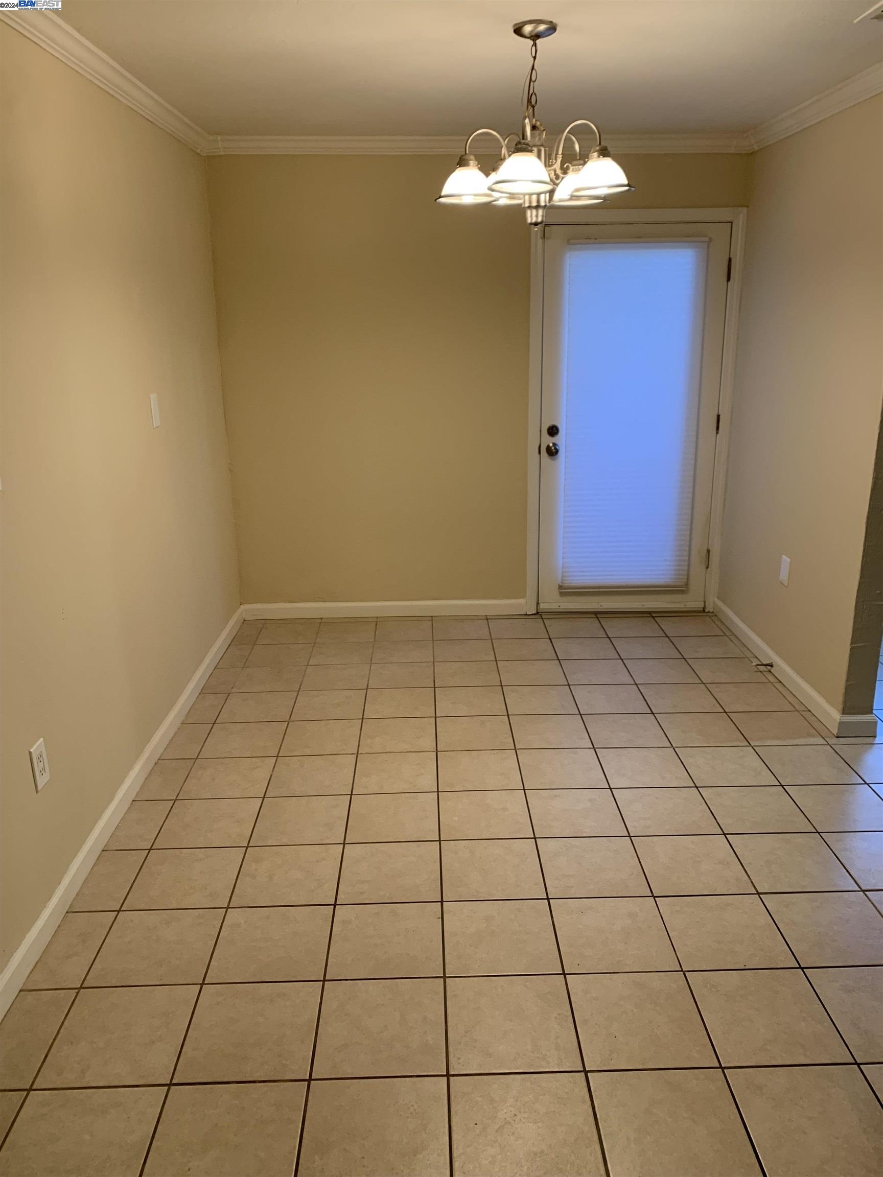 26730 Tyrrell Avenue Hayward, CA 94544 - Photo 9 of 26 a view of an empty room with a window