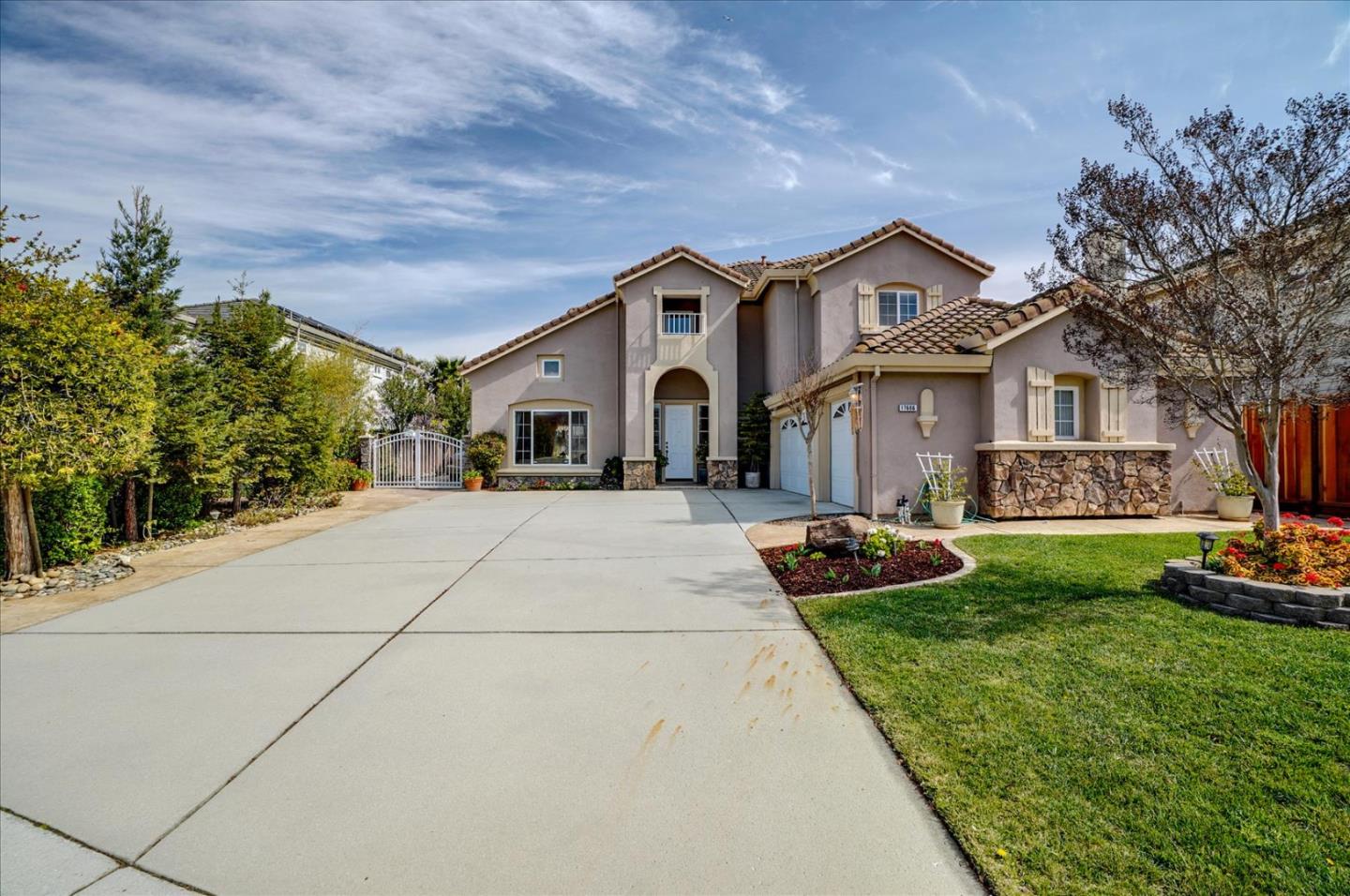 17686 Bentley Drive Morgan Hill, CA 95037 - Photo 1 of 30 a front view of a house with a garden