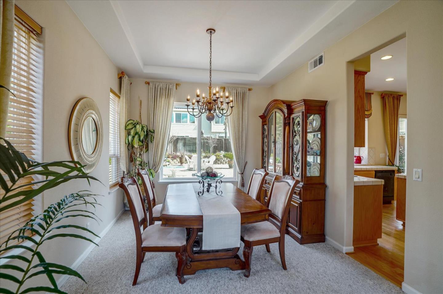 17686 Bentley Drive Morgan Hill, CA 95037 - Photo 12 of 30 a view of a dining room with furniture window and wooden floor