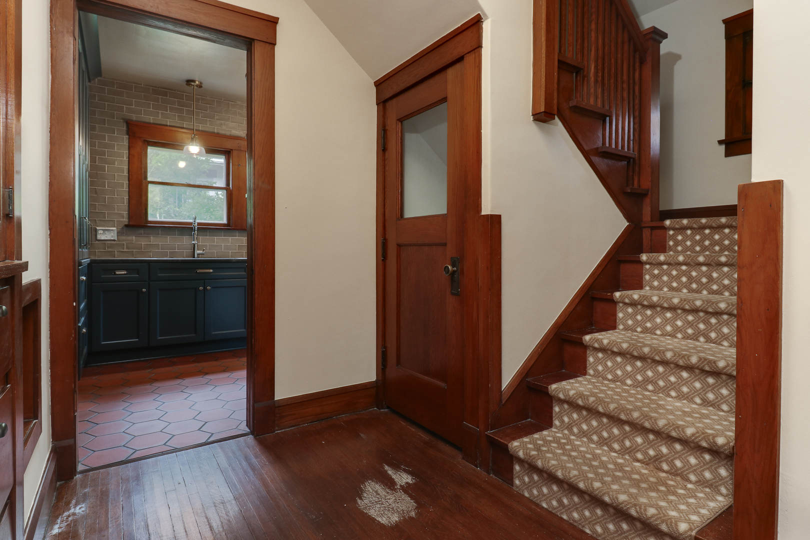 4 Clinton Place Normal, IL 61761 - Photo 20 of 38 a view of a hallway with wooden floor and entryway