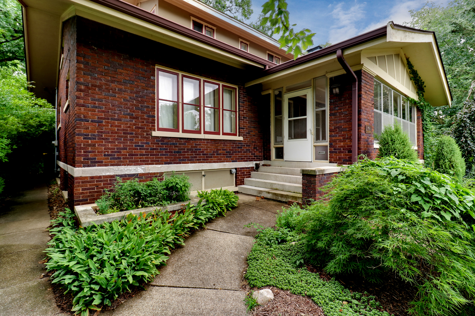 4 Clinton Place Normal, IL 61761 - Photo 2 of 38 a front view of a house with a yard