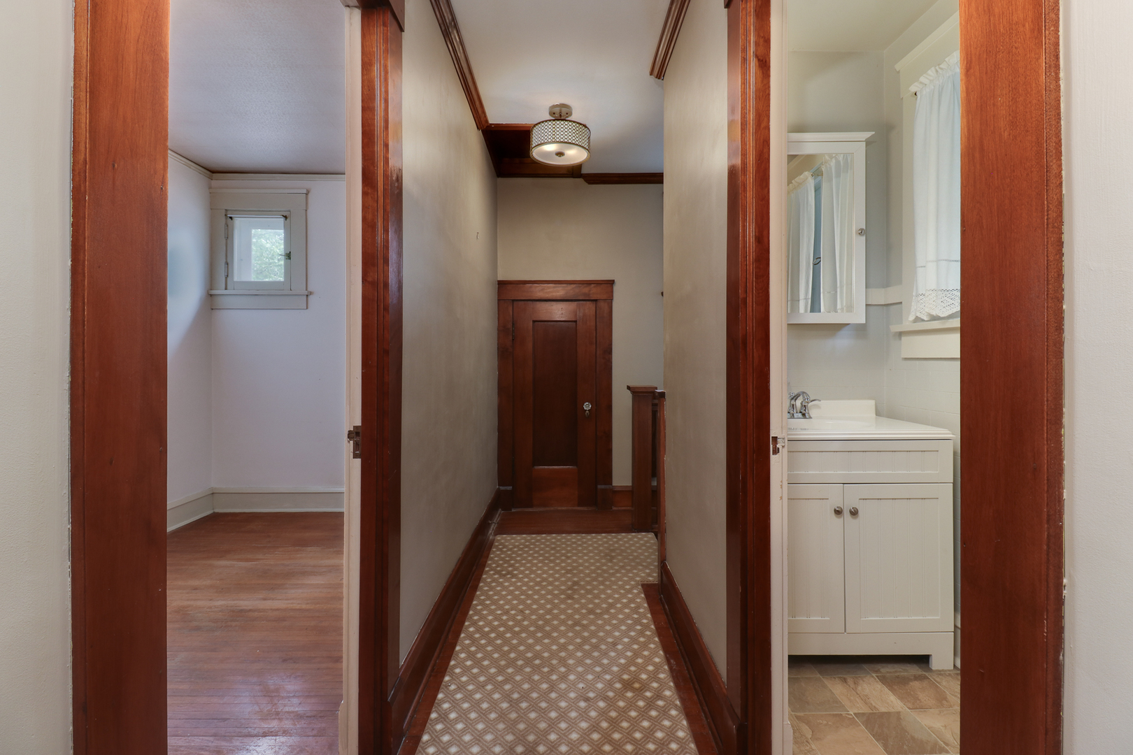 4 Clinton Place Normal, IL 61761 - Photo 21 of 38 a view of a hallway with wooden floor