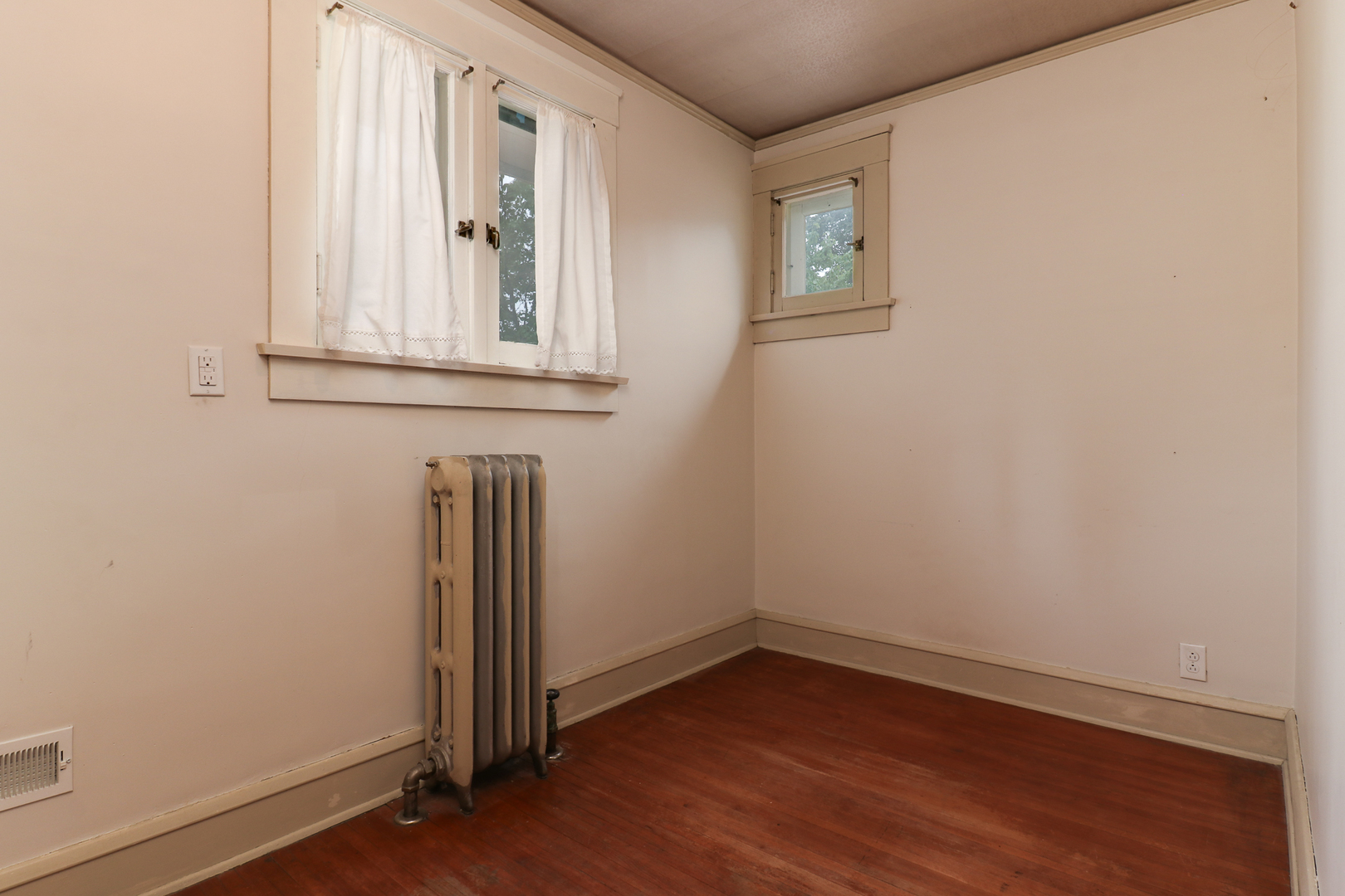 4 Clinton Place Normal, IL 61761 - Photo 25 of 38 an empty room with wooden floor and windows