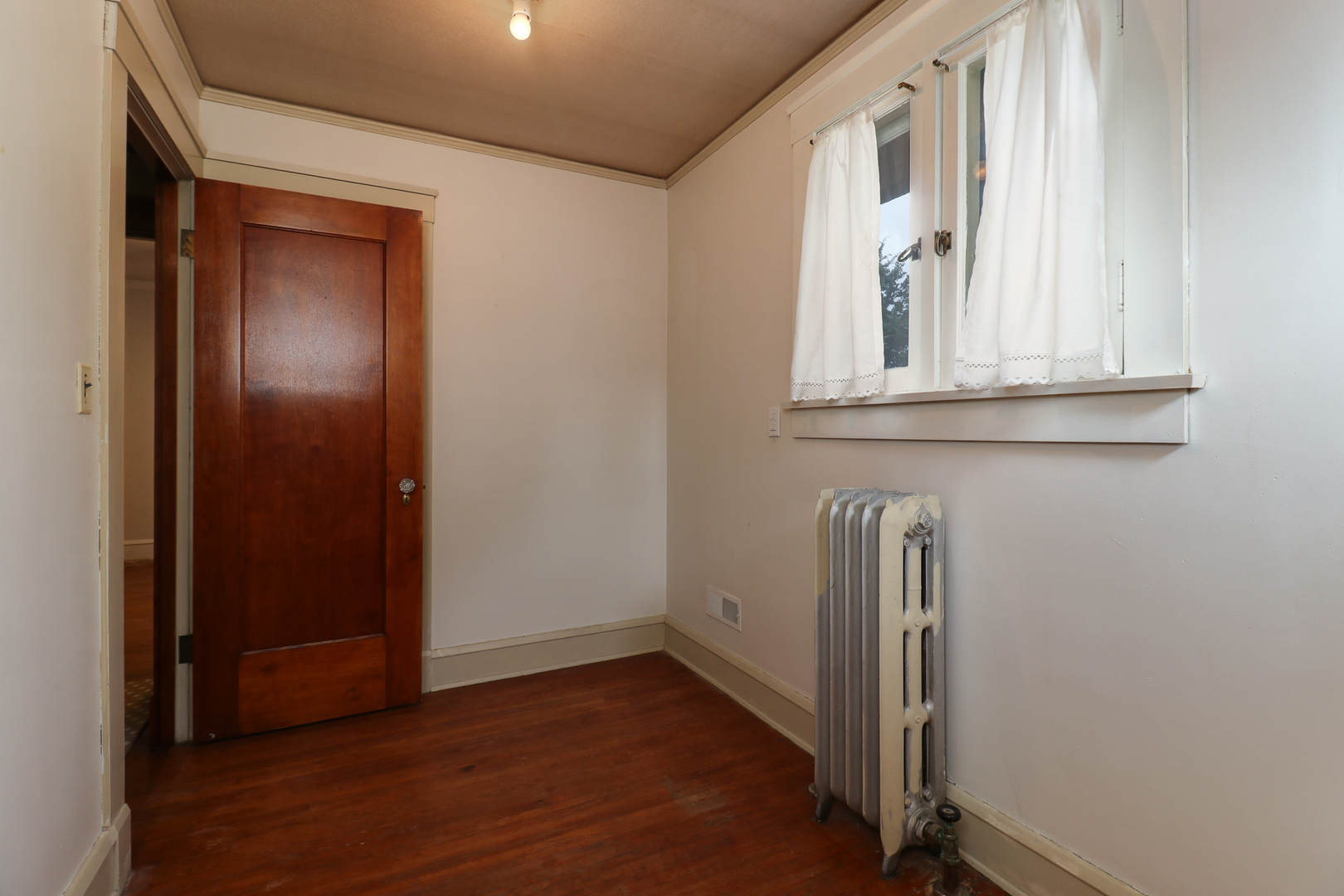 4 Clinton Place Normal, IL 61761 - Photo 26 of 38 an empty room with wooden floor and windows
