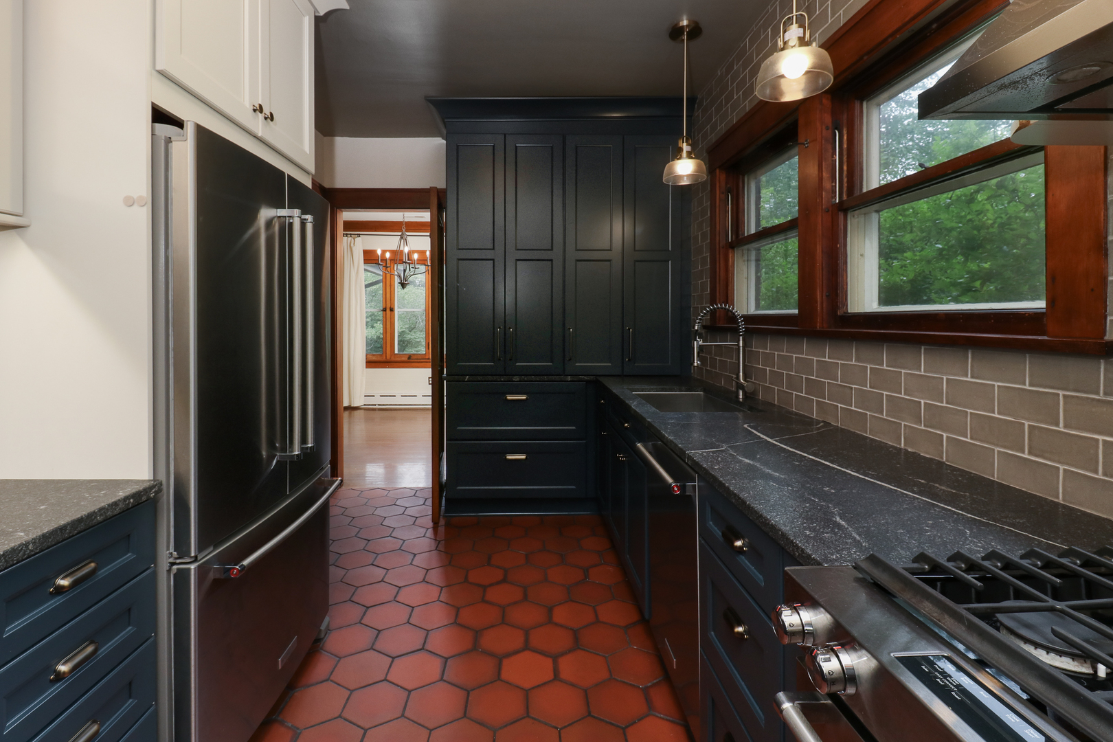 4 Clinton Place Normal, IL 61761 - Photo 6 of 38 a kitchen with sink a refrigerator and window