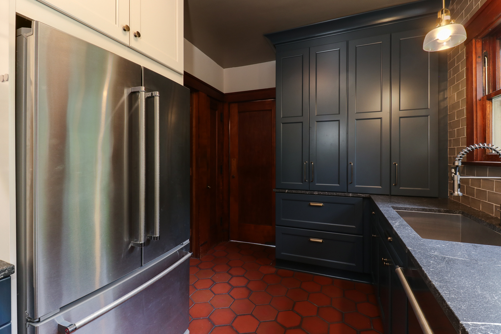 4 Clinton Place Normal, IL 61761 - Photo 7 of 38 a kitchen with a refrigerator and a sink