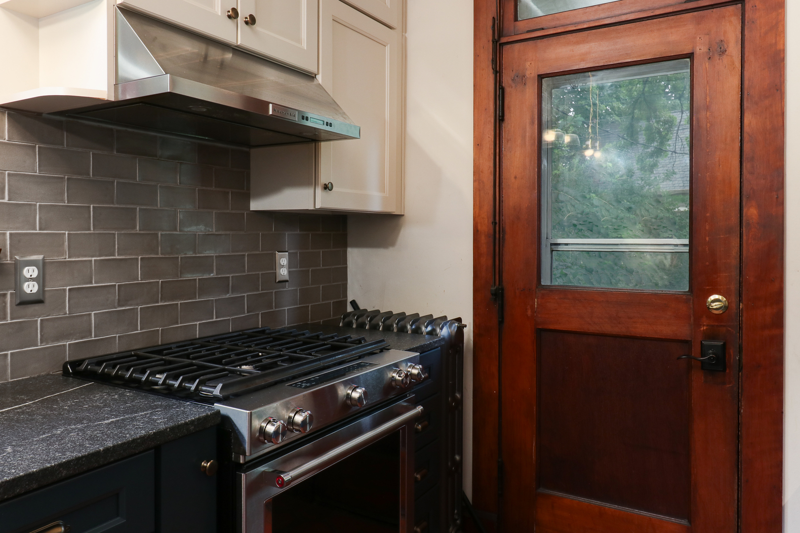 4 Clinton Place Normal, IL 61761 - Photo 10 of 38 a stove top oven sitting inside of a kitchen