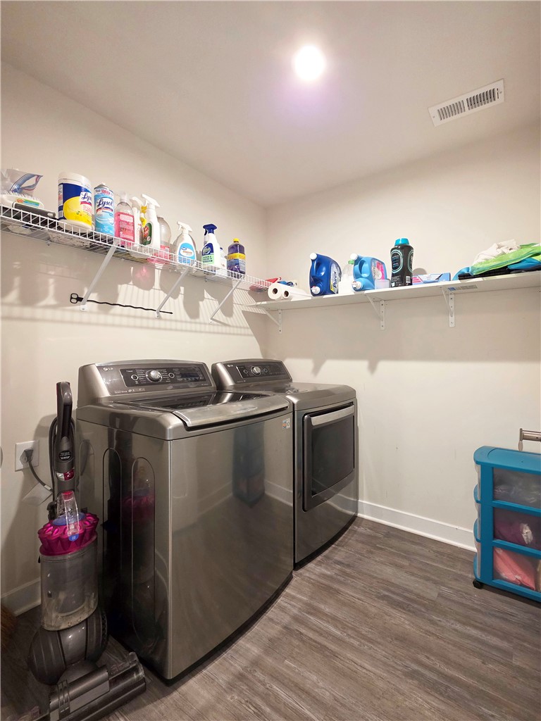 224 Bronson Ridge Anderson, SC 29621 - Photo 21 of 42 Functional laundry room equipped with modern appliances and ample storage space.