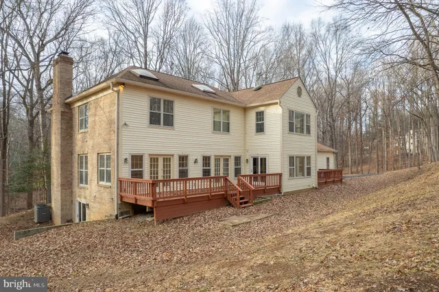 a view of an empty room with windows