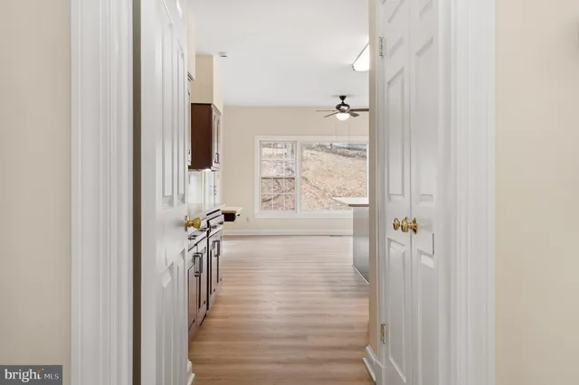 a view of fireplace and wooden floor