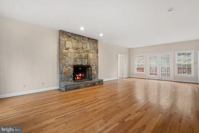 a bathroom with a double vanity sink and mirror