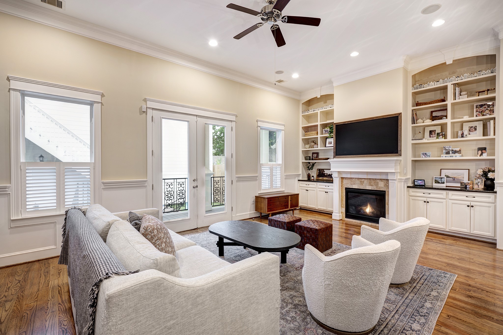 1010 Nicholson Street Houston, TX 77008 - Photo 12 of 28 a living room with furniture a fireplace and a flat screen tv