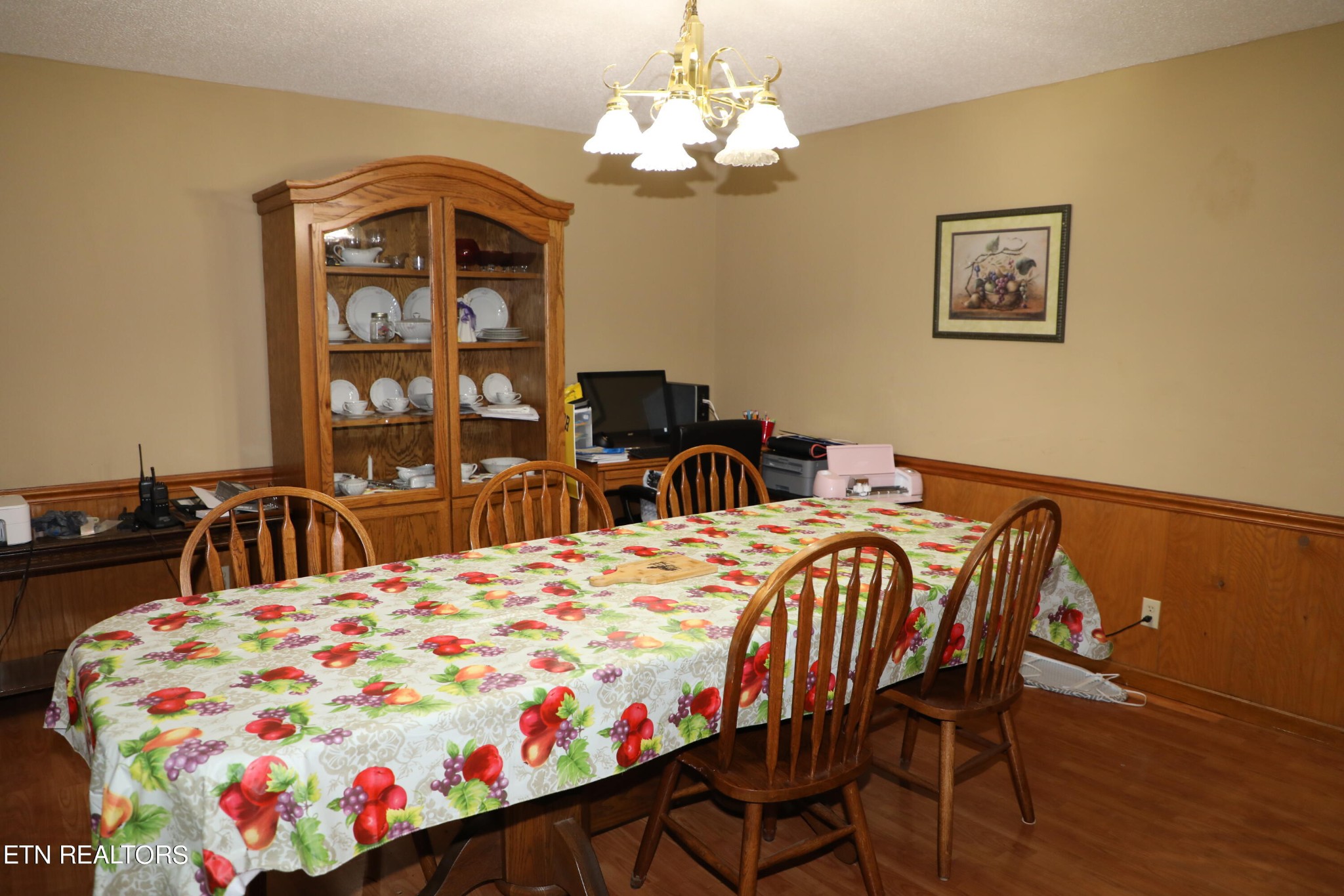 166 Donaldson Road Philadelphia, TN 37846 - Photo 11 of 42 a bedroom with a bed and a chandelier