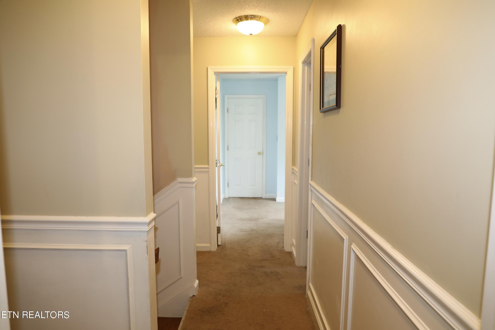 166 Donaldson Road Philadelphia, TN 37846 - Photo 15 of 42 a view of a hallway with wooden floor and staircase