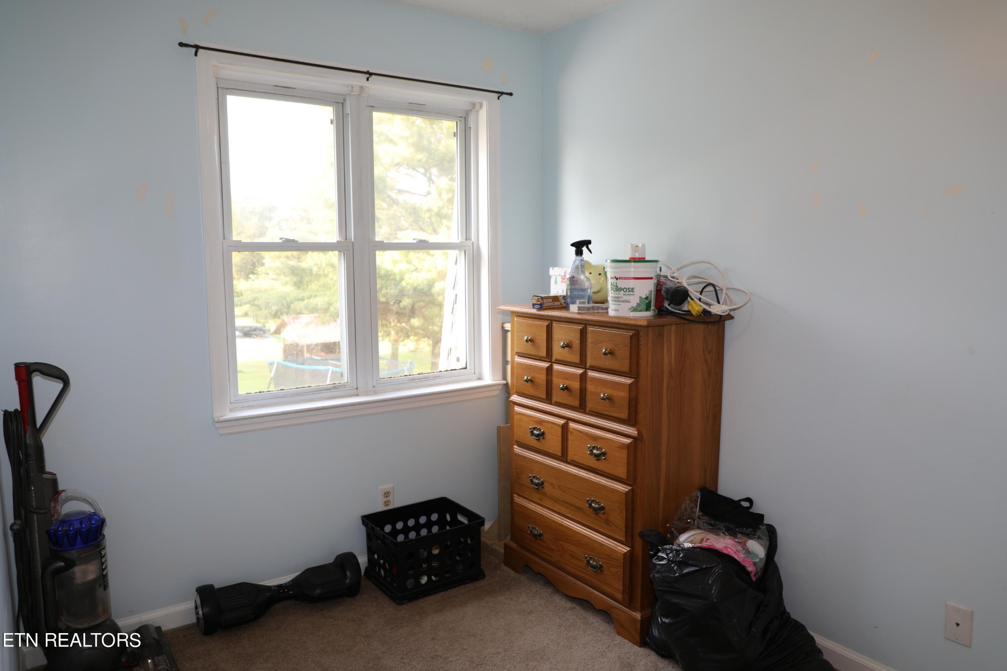 166 Donaldson Road Philadelphia, TN 37846 - Photo 26 of 42 a room with a closet and a window