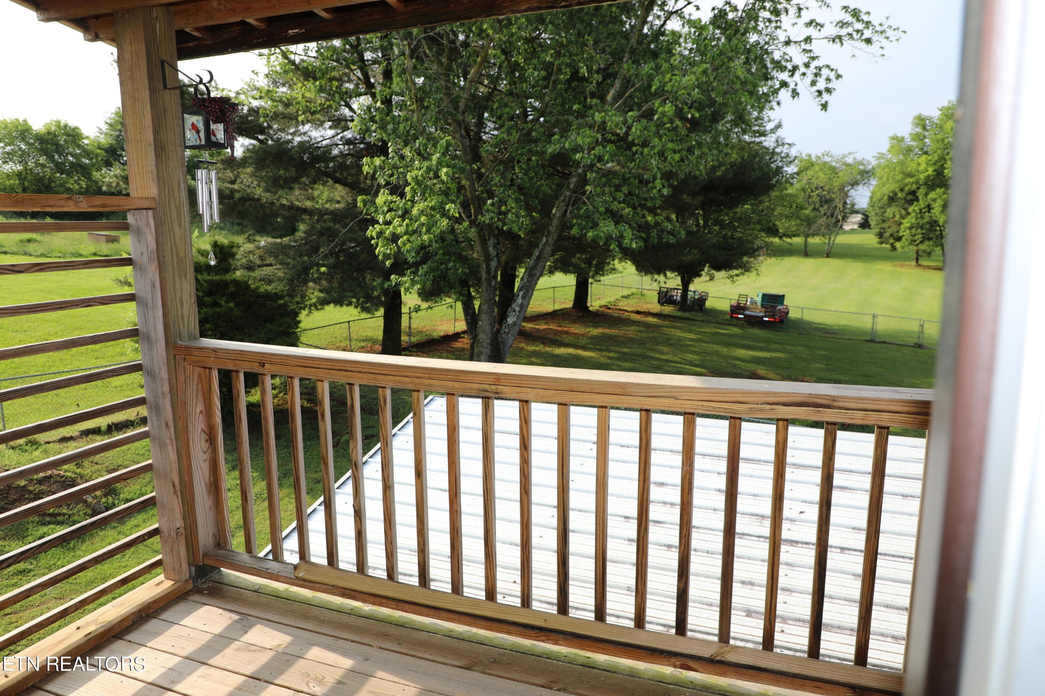 166 Donaldson Road Philadelphia, TN 37846 - Photo 29 of 42 a view of a porch with a yard
