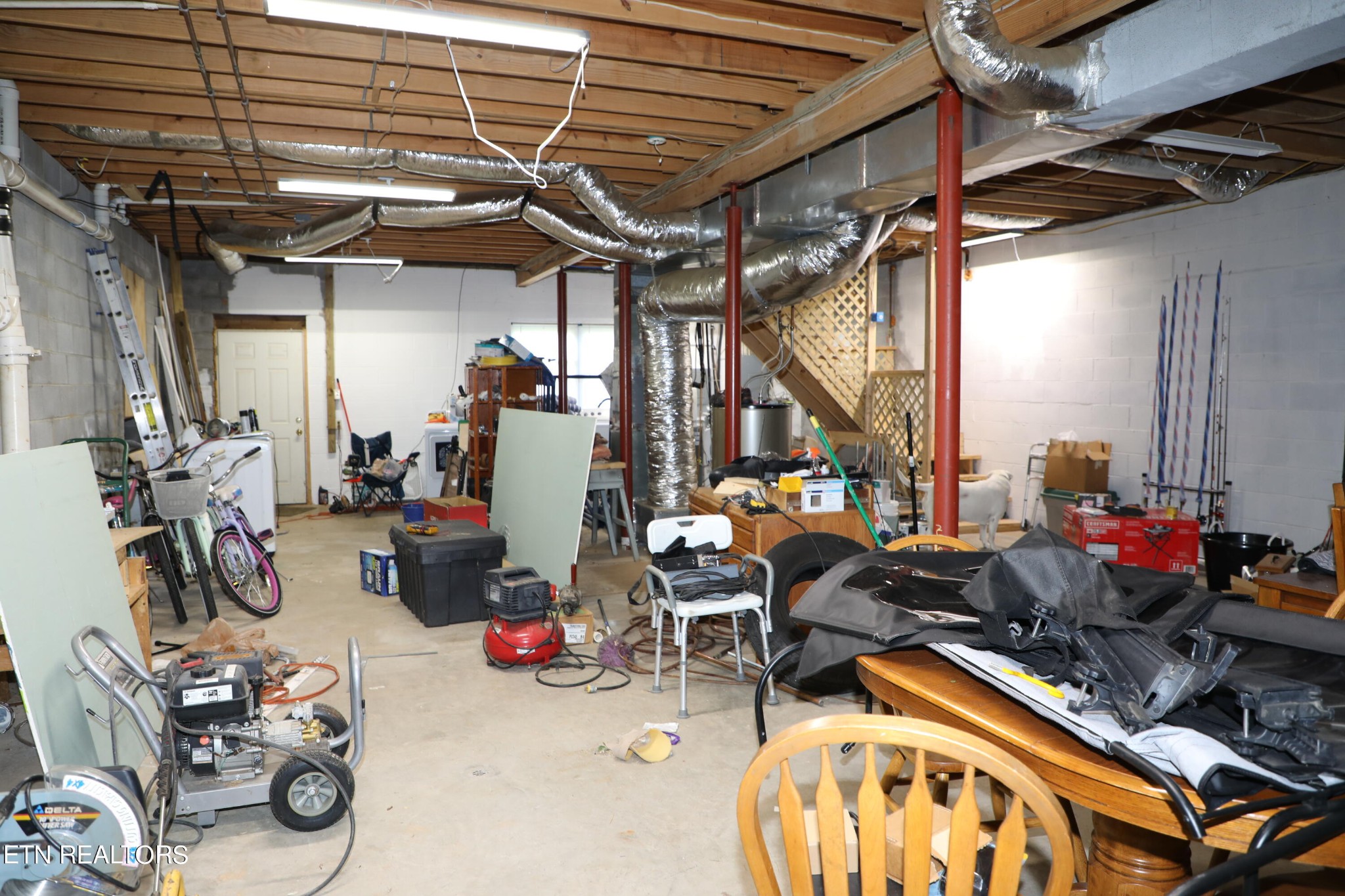 166 Donaldson Road Philadelphia, TN 37846 - Photo 32 of 42 a view of a bike storage area with wooden floor