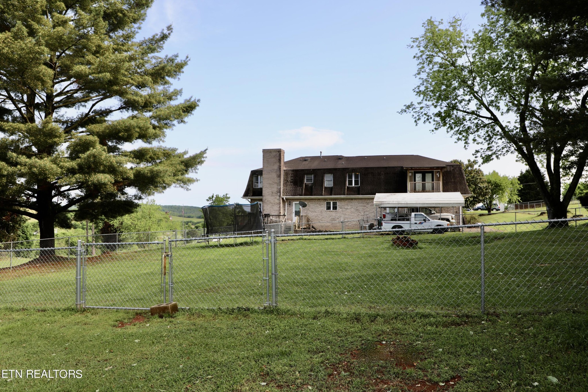 166 Donaldson Road Philadelphia, TN 37846 - Photo 37 of 42 a house view with a garden space