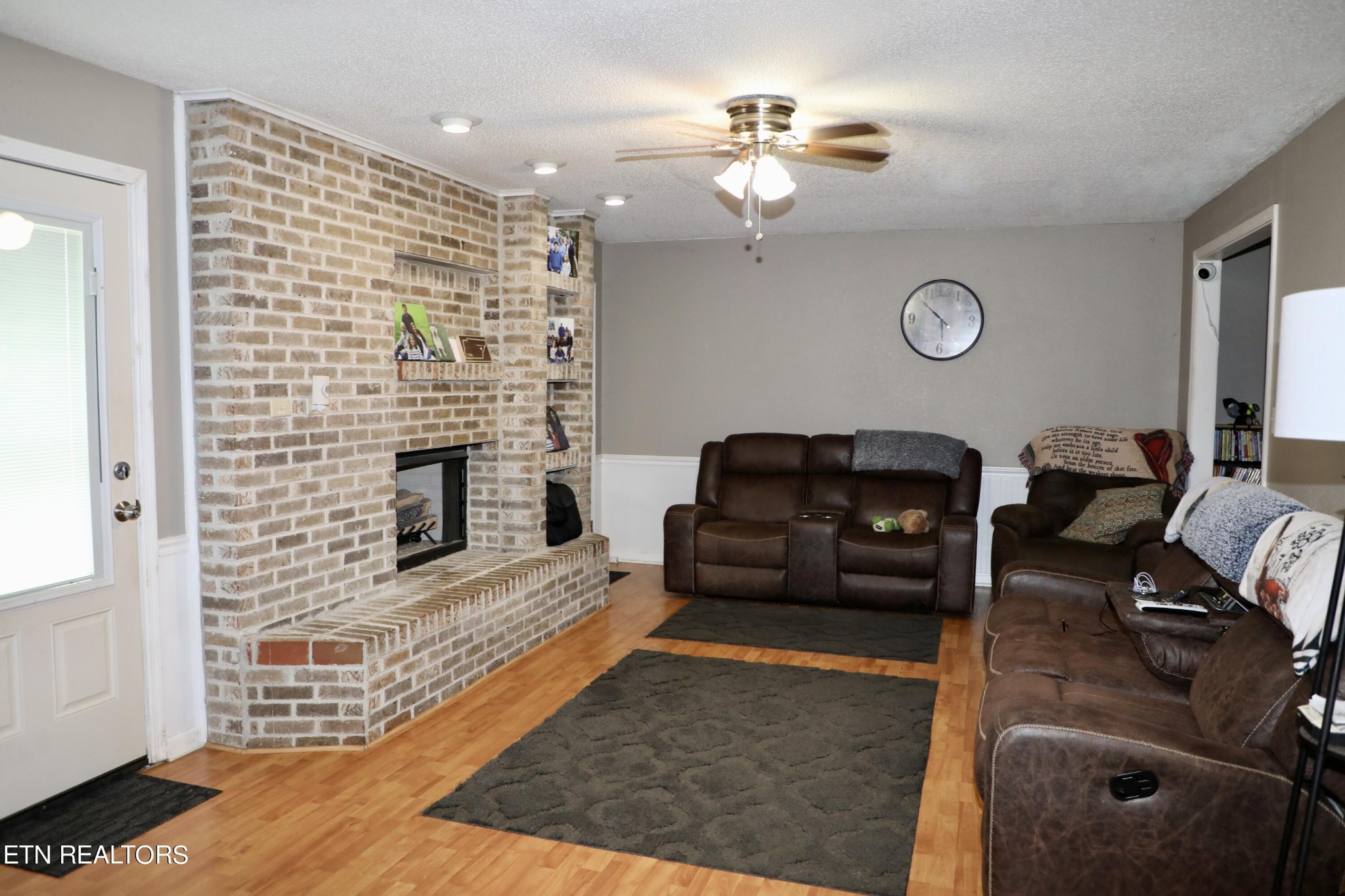 166 Donaldson Road Philadelphia, TN 37846 - Photo 4 of 42 a living room with furniture and a fireplace