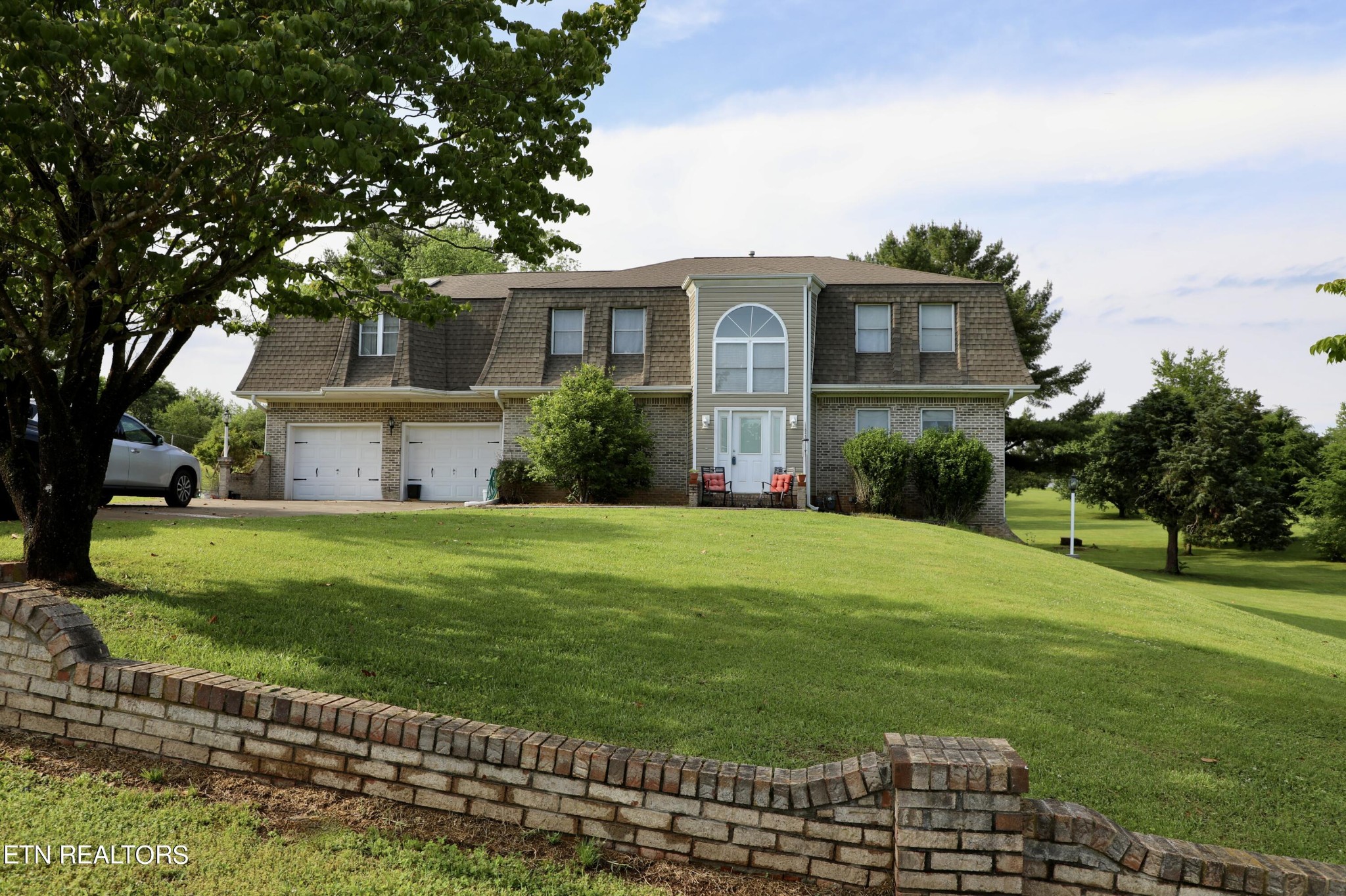 166 Donaldson Road Philadelphia, TN 37846 - Photo 42 of 42 a front view of a house with a yard