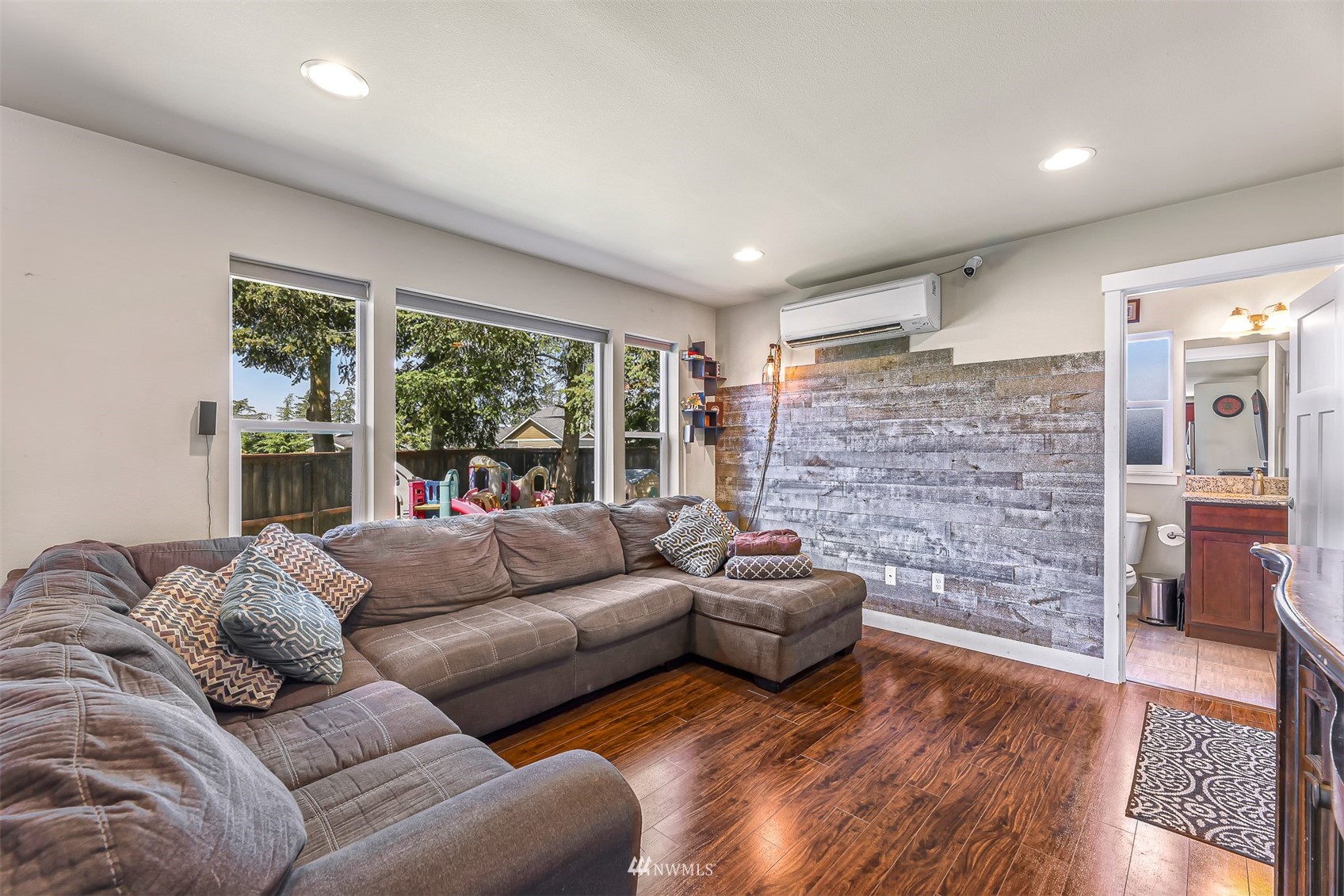 4601 Hall Road Blaine, WA 98230 - Photo 12 of 39 a living room with furniture and a fireplace