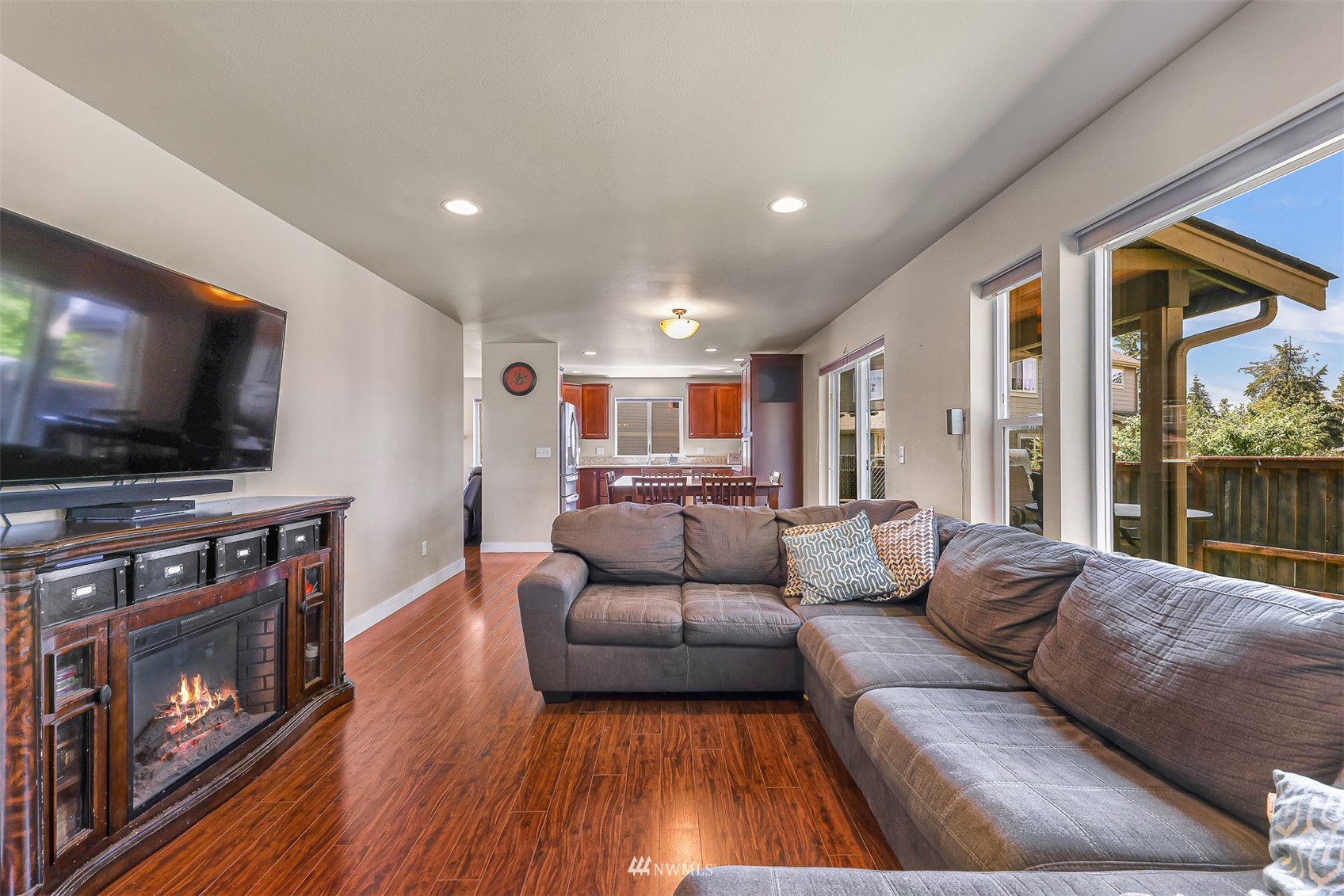 4601 Hall Road Blaine, WA 98230 - Photo 14 of 39 a living room with furniture and a flat screen tv