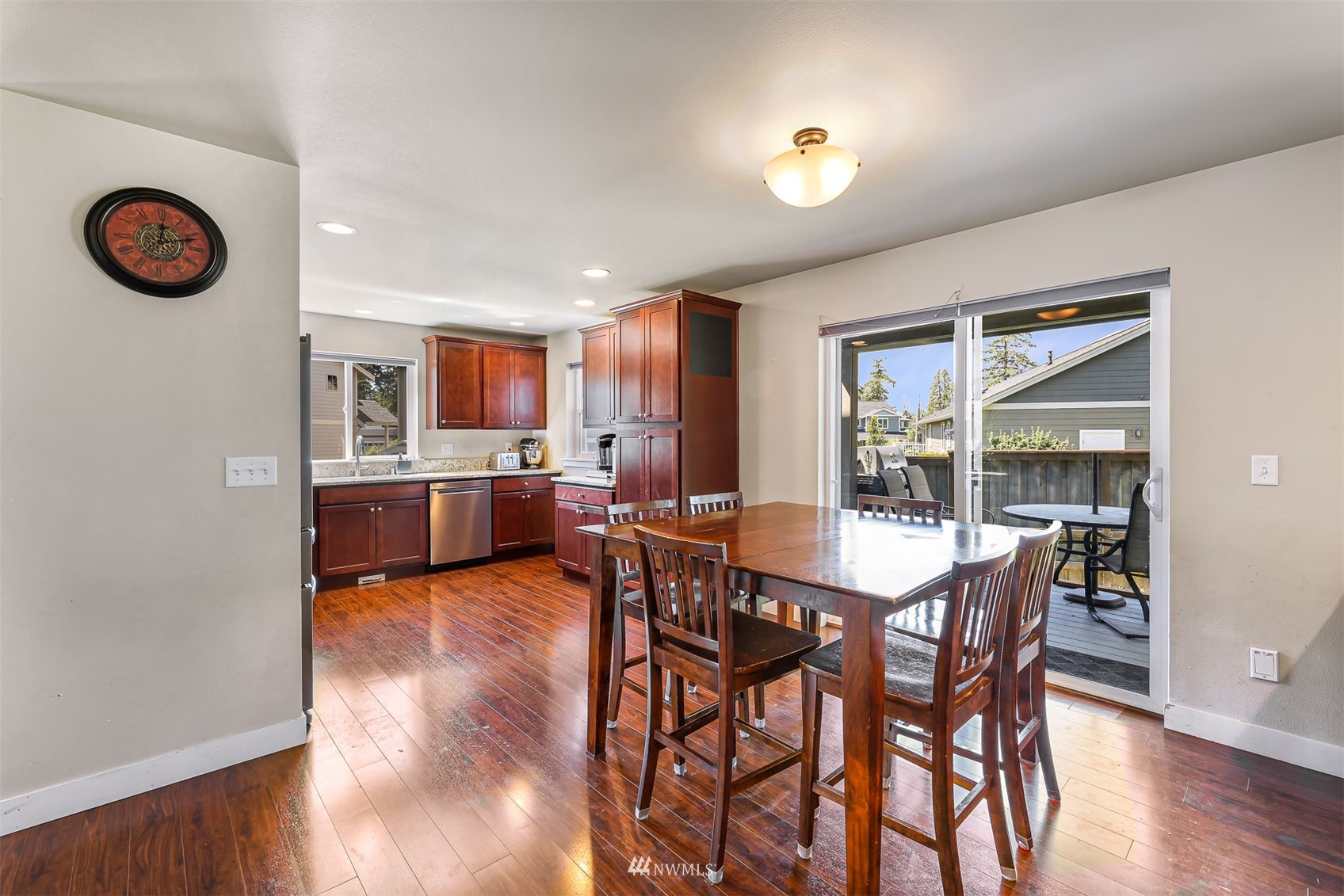 4601 Hall Road Blaine, WA 98230 - Photo 15 of 39 a view of a dining room with furniture wooden floor and a window