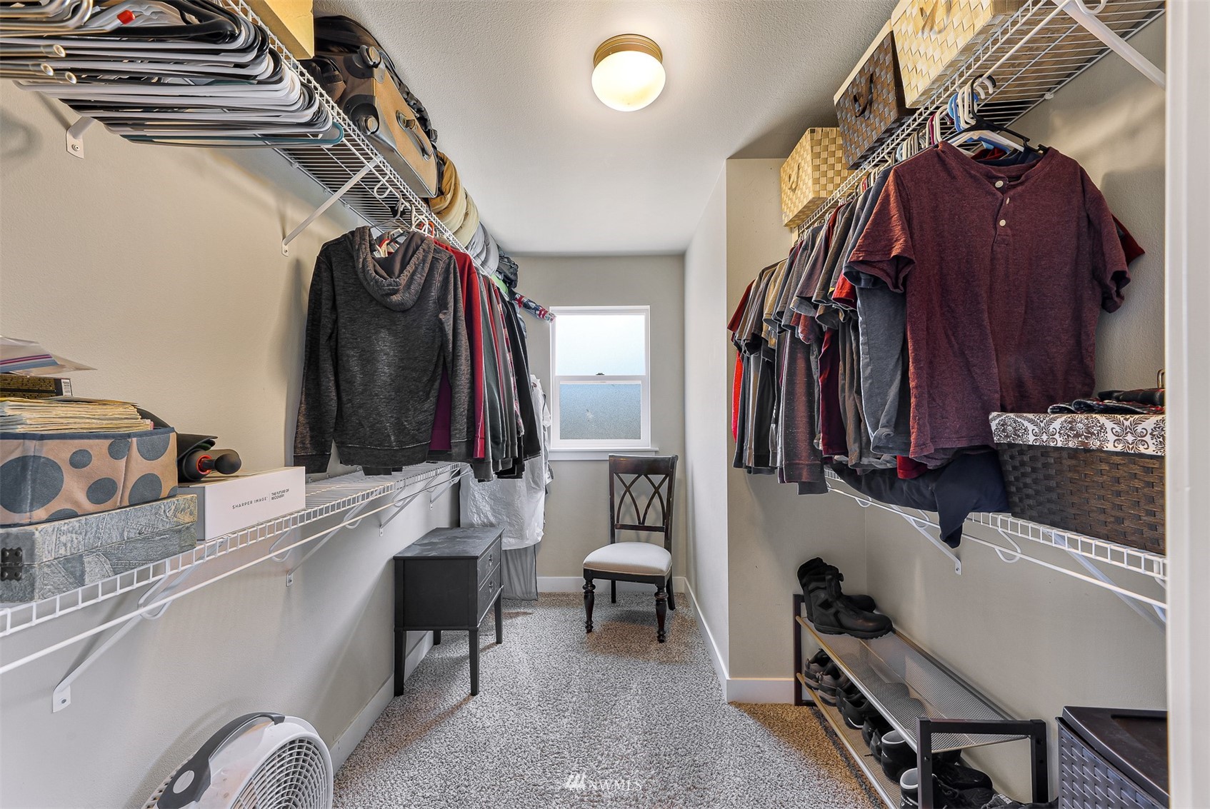 4601 Hall Road Blaine, WA 98230 - Photo 23 of 39 a view of walk in closet with clothes and shoes