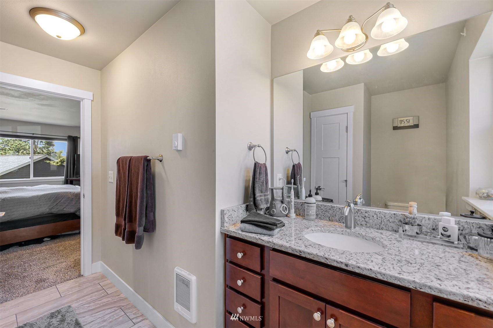 4601 Hall Road Blaine, WA 98230 - Photo 25 of 39 a bathroom with a double vanity sink and a mirror