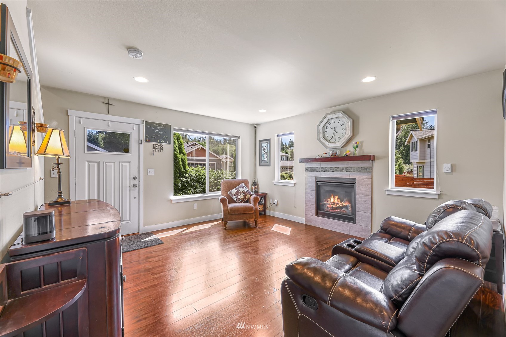4601 Hall Road Blaine, WA 98230 - Photo 8 of 39 a living room with furniture and a fireplace