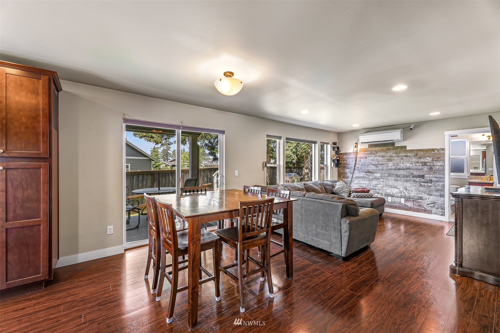 4601 Hall Road Blaine, WA 98230 - Photo 9 of 39 a view of a dining room with furniture window and wooden floor