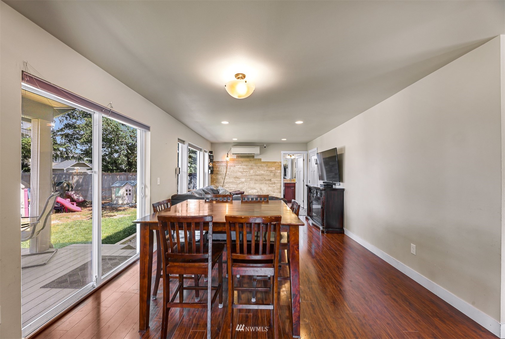 4601 Hall Road Blaine, WA 98230 - Photo 10 of 39 a view of a dining room with furniture window and wooden floor