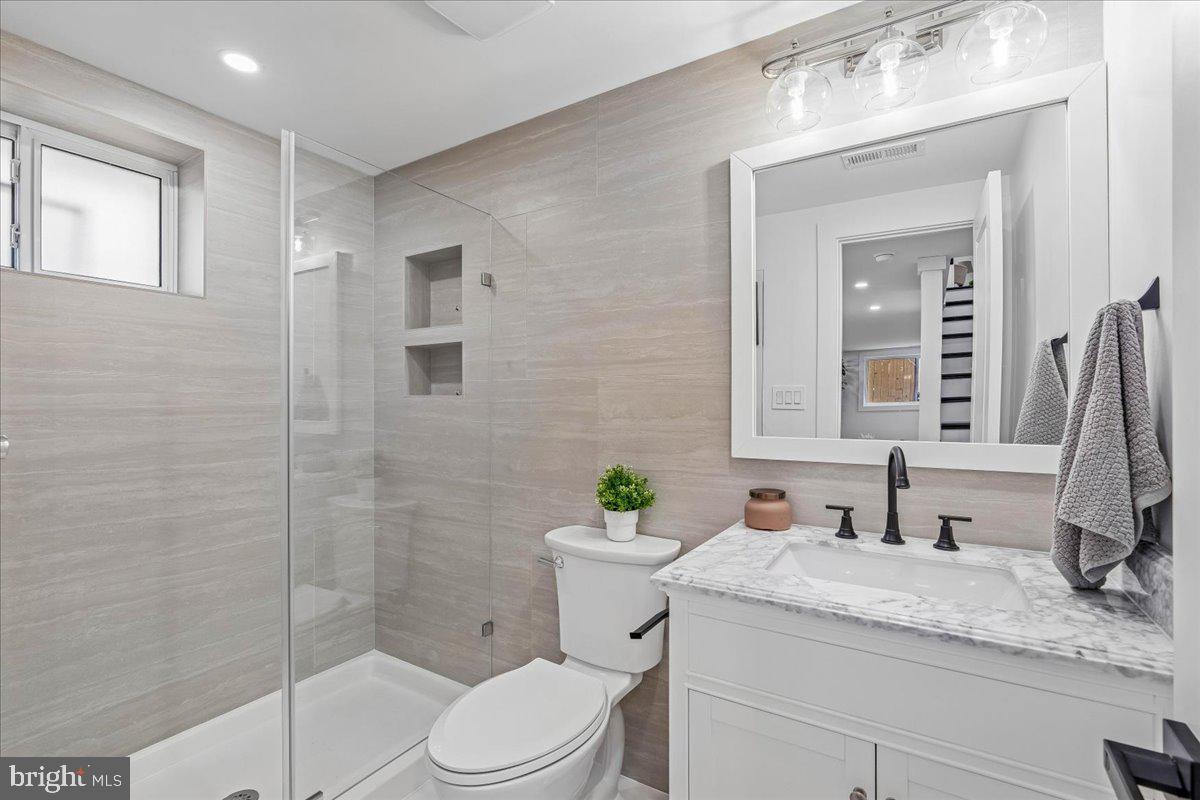 4000 Adams Drive Silver Spring, MD 20902 - Photo 20 of 21 Sleek modern bathroom oasis.