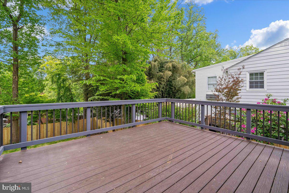 4000 Adams Drive Silver Spring, MD 20902 - Photo 8 of 21 Serene deck surrounded by lush greenery.